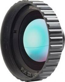 Objective lens with a ridged edge and a blue-green reflection on the glass surface.