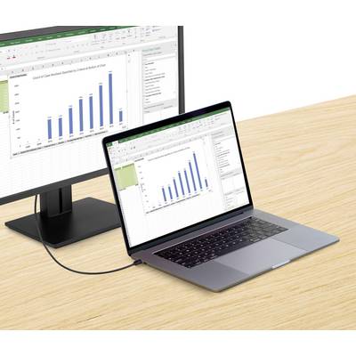 A laptop is connected to a monitor and both are displaying a bar chart in a spreadsheet.