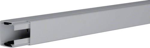 Silver metal cable trunking, rectangular and elongated, for the safe routing of electrical cables in rooms.