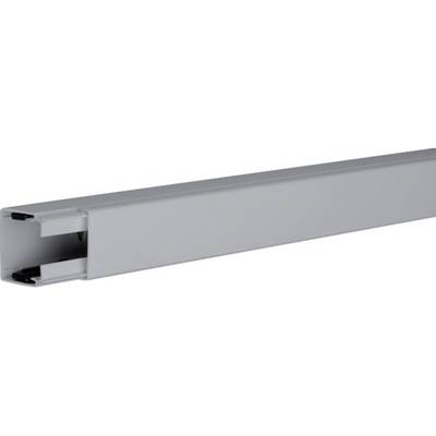 Silver metal cable trunking, rectangular and elongated, for the safe routing of electrical cables in rooms.