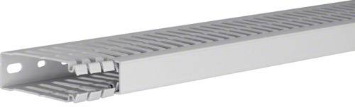 Grey cable trunking with narrow slots for organising cables in electrical installations.
