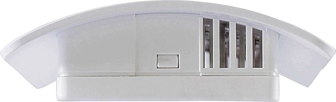 Smoke detector viewed from the side, showing ventilation slots and test button; used for smoke detection and safety.