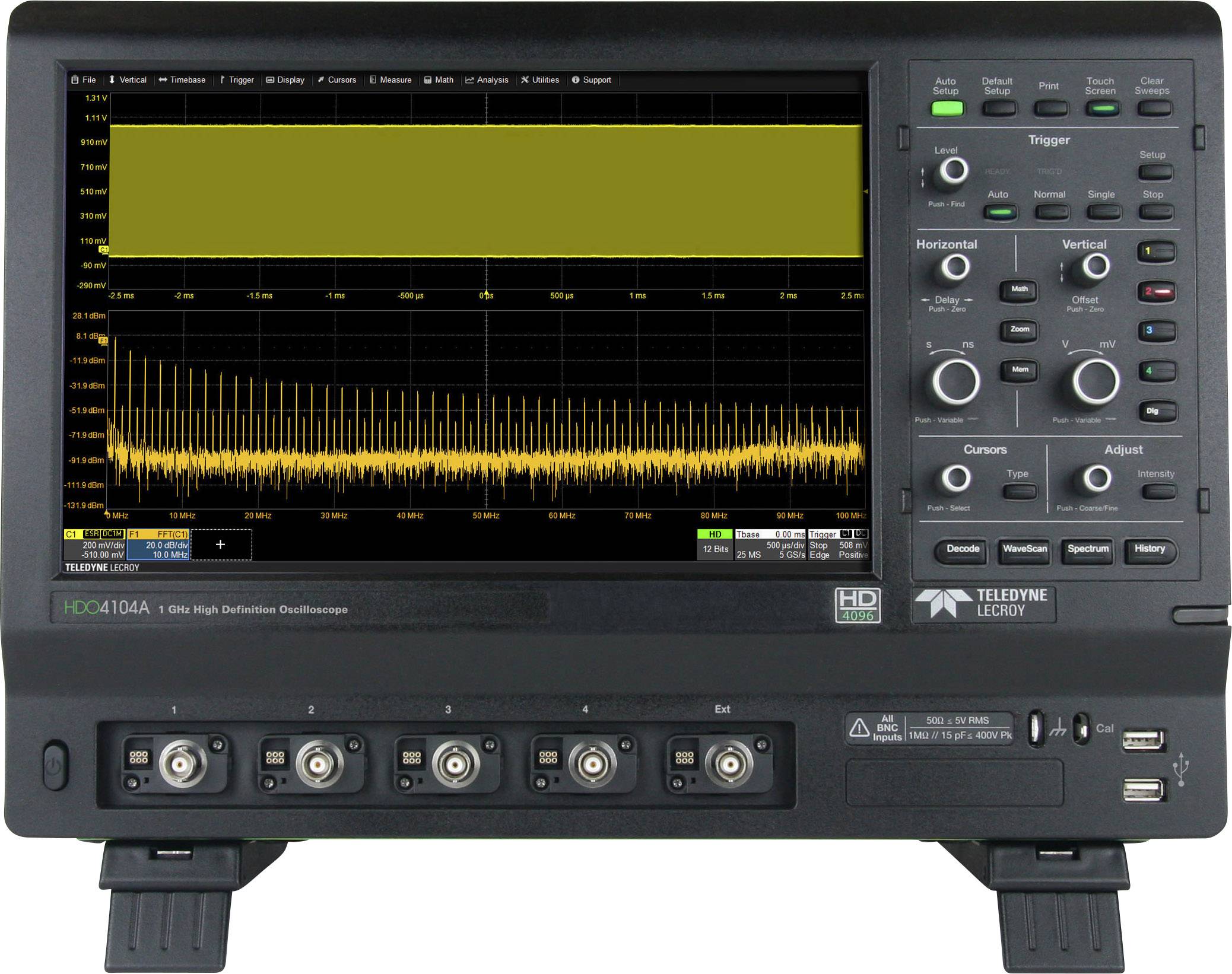 A digital-screen oscilloscope displays two signal waveforms. One curve is coloured yellow and dominates the graph.