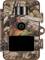 Wildlife camera with camouflage pattern, lens and sensor in the centre. Design adapted for discreet observation in nature.