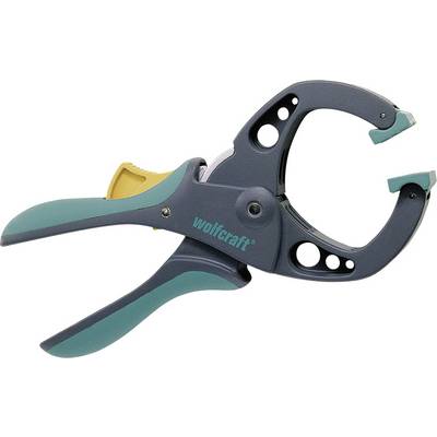 A grey and green spring clamp with a yellow lever, suitable for securing workpieces in craft projects.