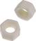 Two white hexagonal plastic nuts.