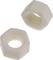 Two white plastic hexagonal nuts, one lying down, the other standing on its tip. They are made from a lightweight material.