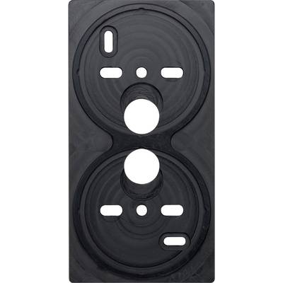 Black, oval plastic plate with several circular and elongated recesses, presumably part of a technical device.