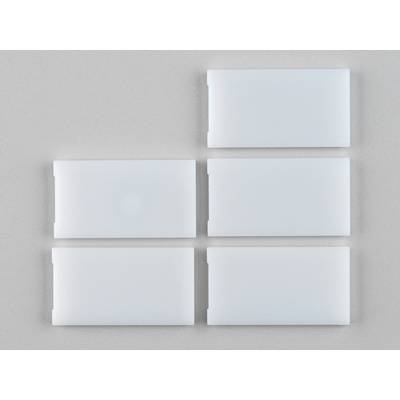 Five rectangular white plastic objects in two rows on a grey background. They are rectangular and appear to be the same size.
