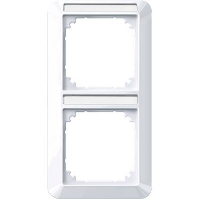 Two square openings of a white, rectangular double frame for electrical switches or sockets, arranged one above the other.