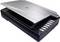 Flatbed scanner with open lid, several buttons visible on the side.