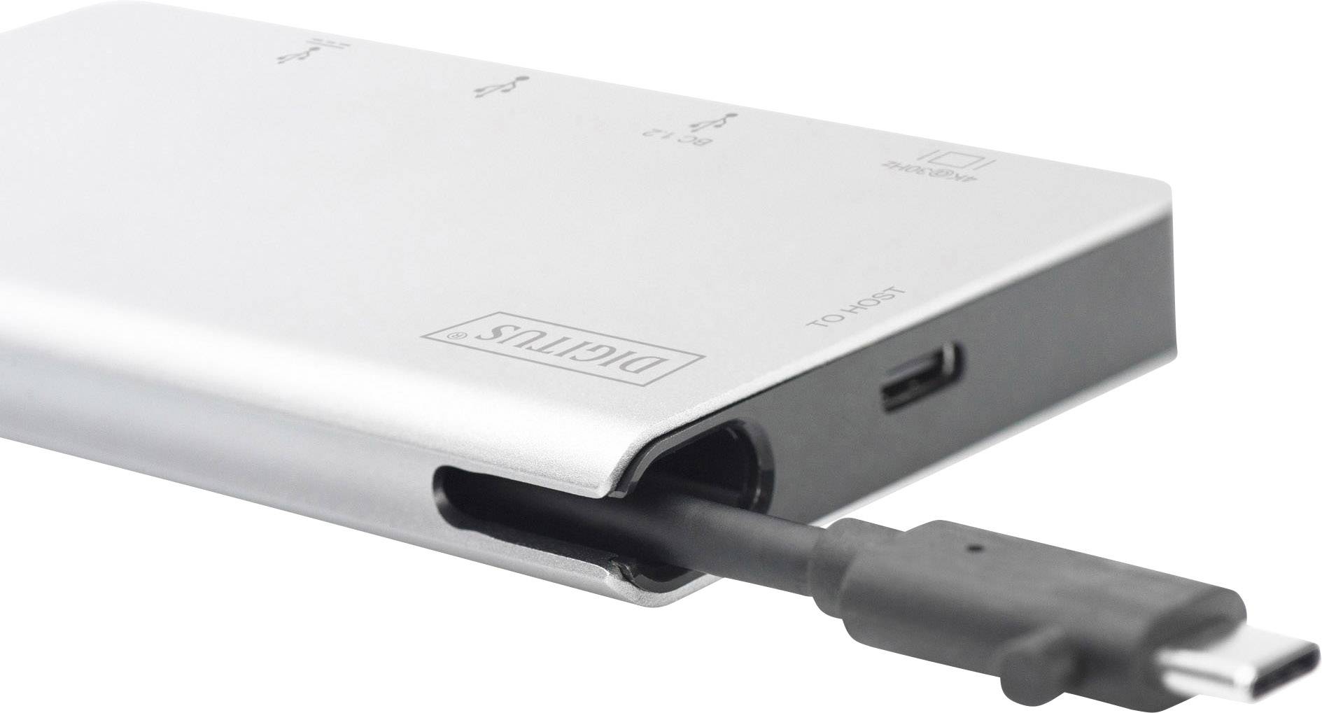 A silver-coloured, rectangular device with a cable connection on the side. It is likely used as an adapter or charger.