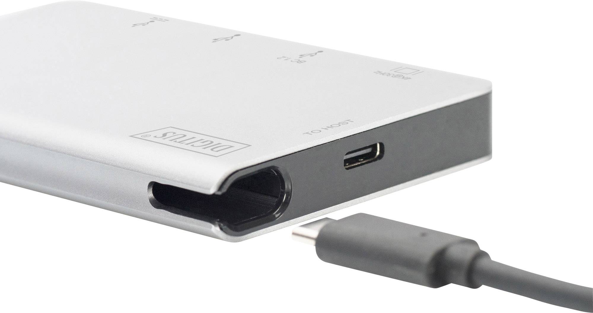 A silver USB hub with multiple ports, including a USB-C port, alongside a separate USB-C cable.