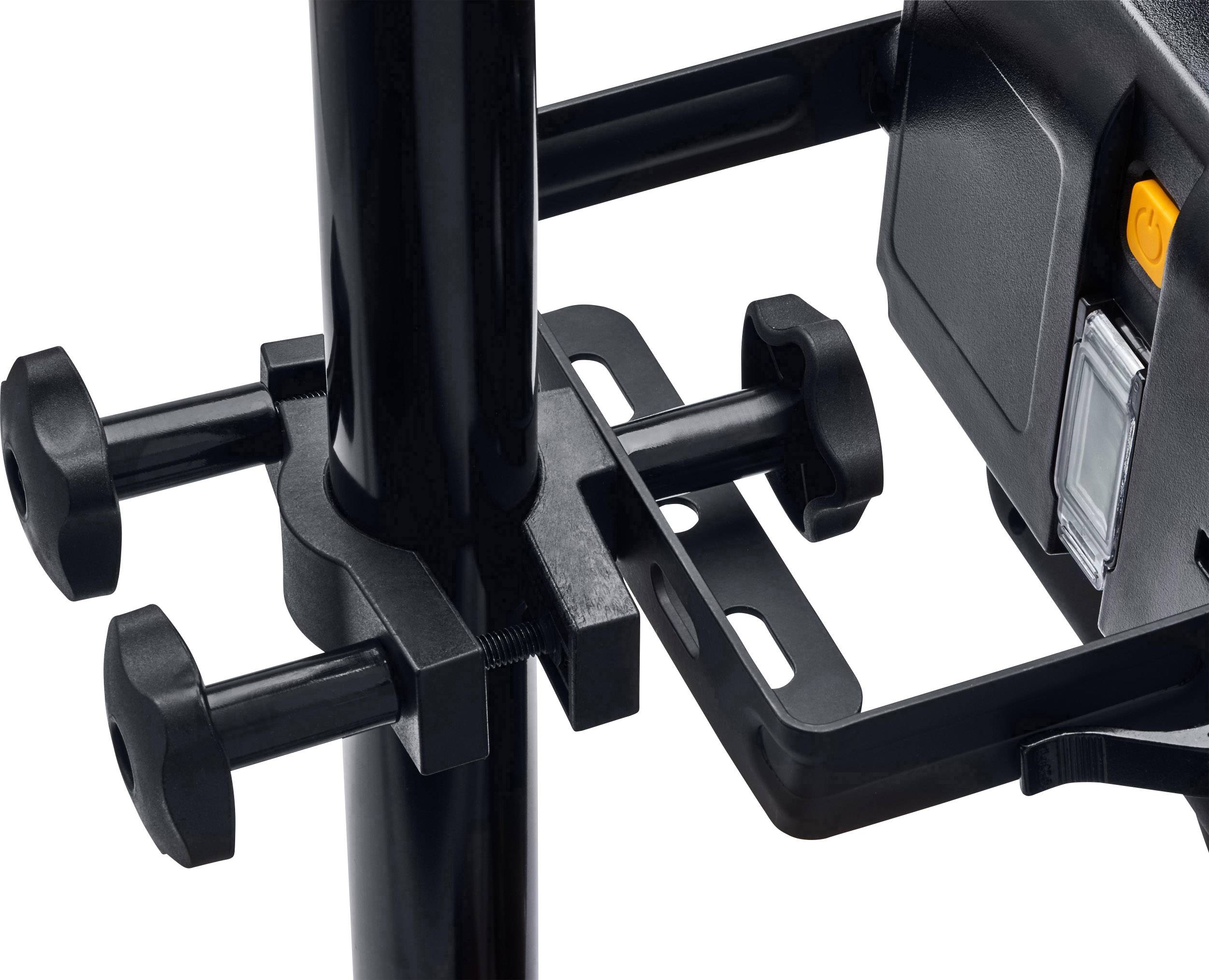 Black stand with mounting brackets and electrical component mounted on a vertical pole.