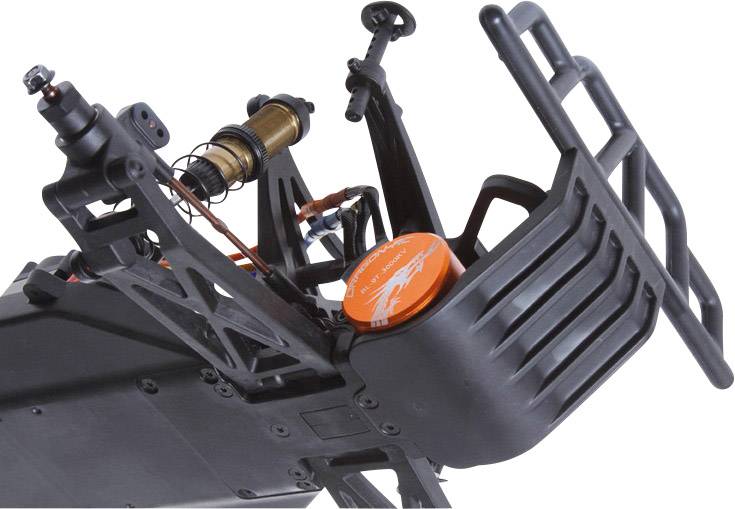 Close-up of part of a remote-controlled car with visible shock absorbers and black chassis.