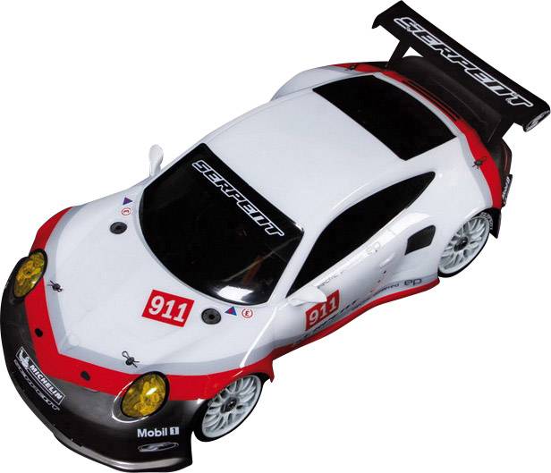 A toy racing car in white with red details, numbered '911'. The model has sponsor stickers and a large rear spoiler.