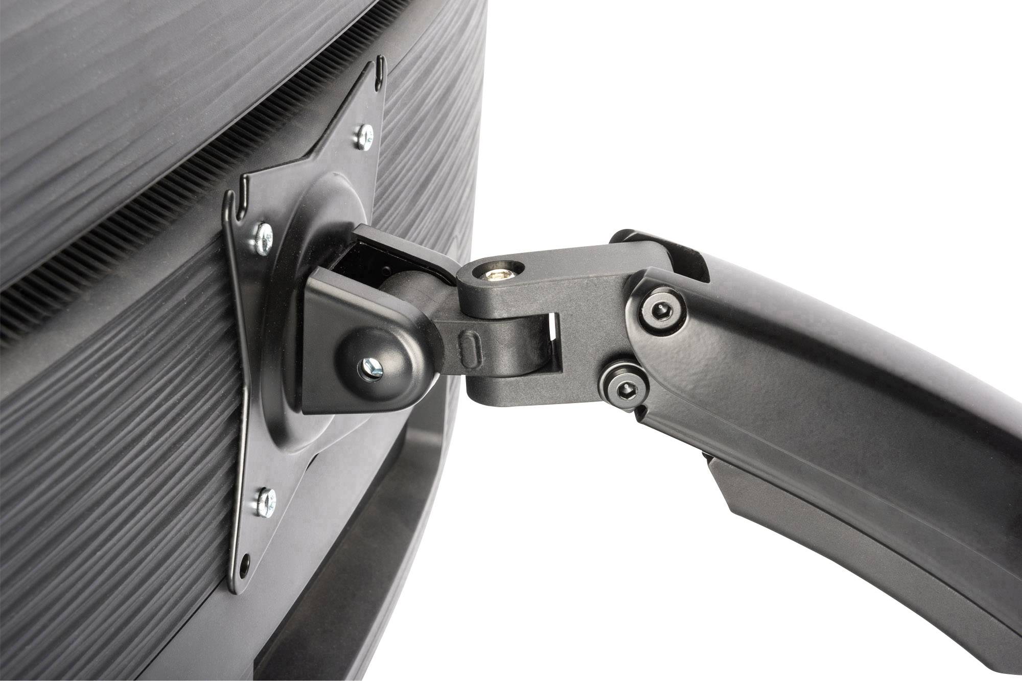 Black metal swing arm attached to the rear of a monitor. Shows joint points for flexible movement and adjustment.