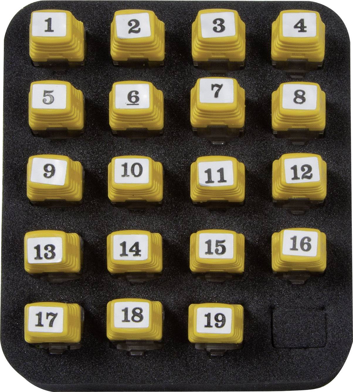 A black plate with 20 yellow, numbered keycaps arranged in four rows, numbered from 1 to 20.