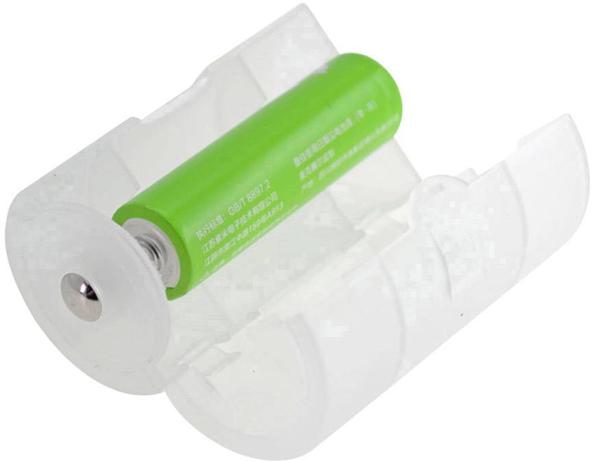A green AA battery in a transparent D-battery adapter, which converts the battery to a larger battery size.