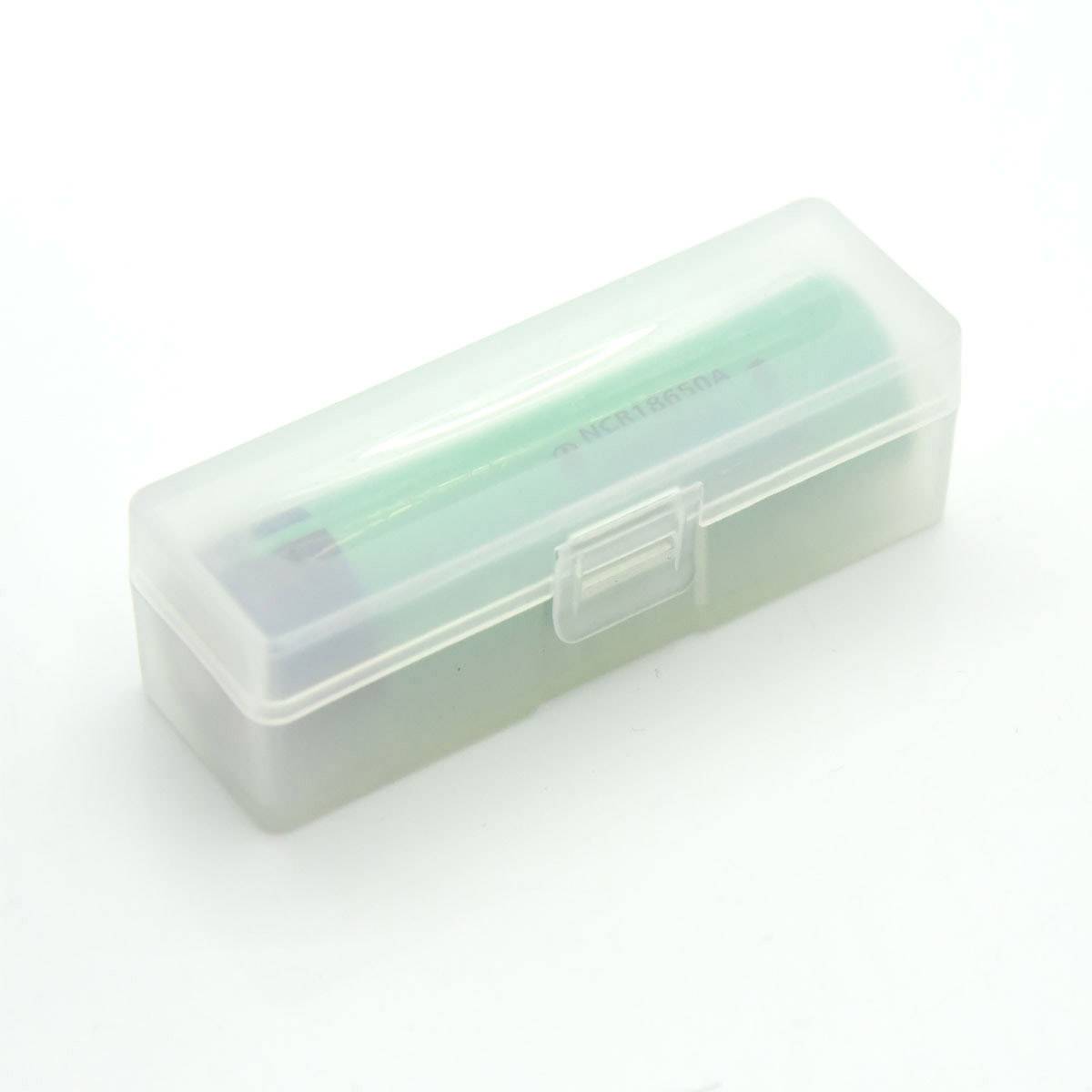 A transparent plastic box containing a green cylindrical object, possibly a battery.