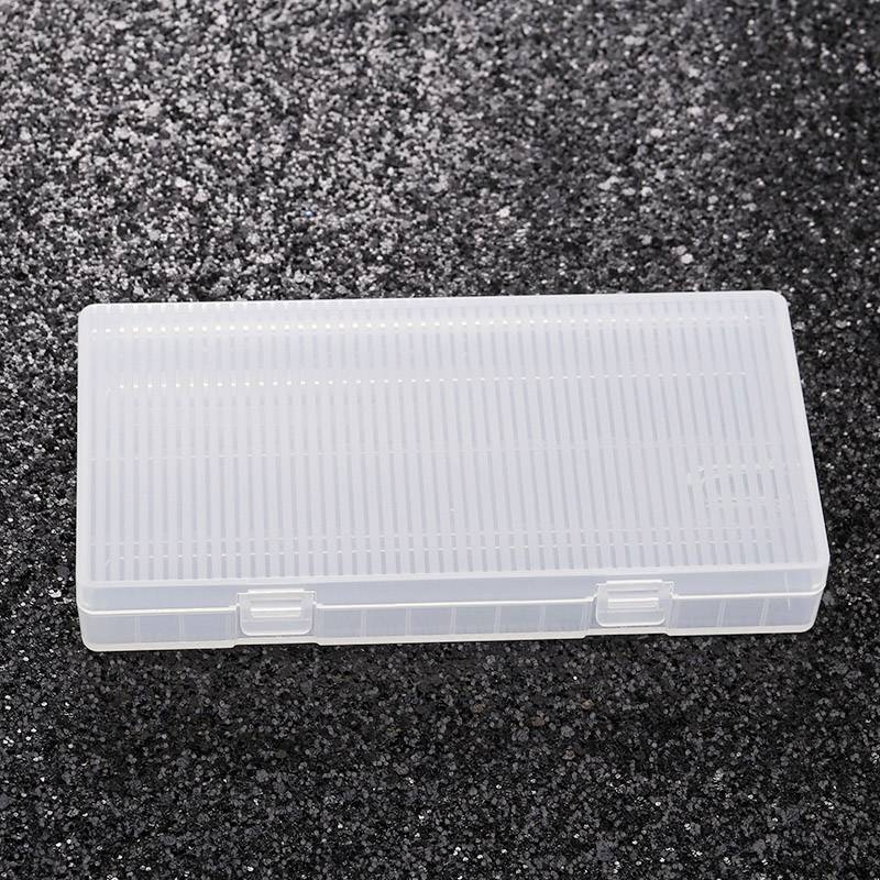 A transparent plastic box on a black background.