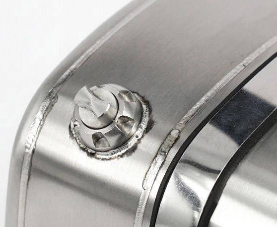 Close-up of a weld seam on a stainless steel object, revealing the precision of the weld and the material's characteristics.