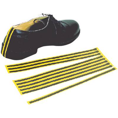 Black shoe with yellow and black stripes along the heel. Several identical stripes lie on the ground in front of it.
