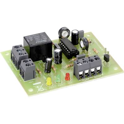 Electronic circuit board with various components such as resistors, capacitors, and a microchip. Used for circuit control.