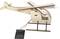 Wooden model of a helicopter with rotating rotors, powered by a connected small solar panel.