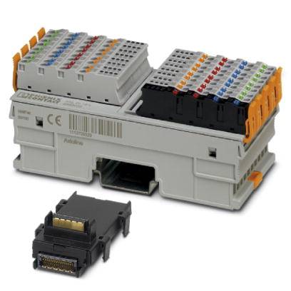 A grey sensor-actuator box with colourful connectors. Beside it lies a removable, black module with golden contacts.