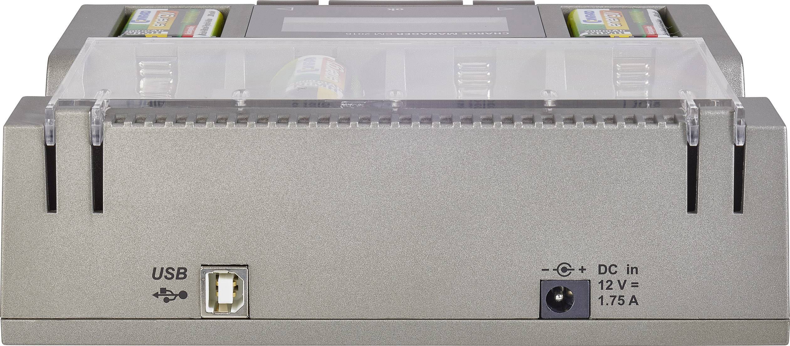 Rear view of a grey electronic device with a USB port and DC input. Two game cartridges are visible on the top.
