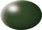 A smooth, dark green oval object with a bright light reflection on its surface.