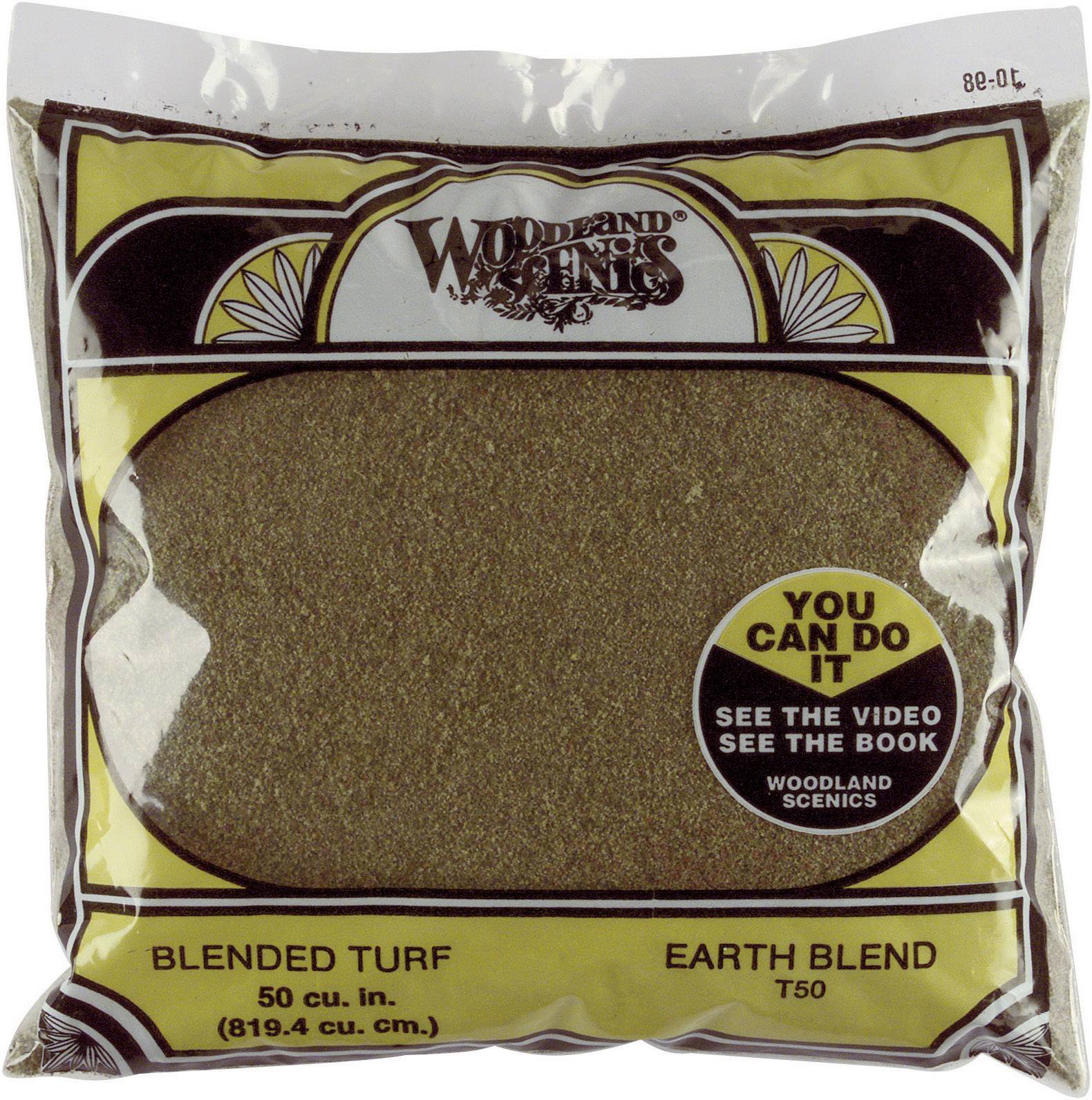 A bag with the label 'Blended Turf Earth Blend'. At the top, it reads 'Woodland Scenics', next to a circle saying 'You Can Do It'.