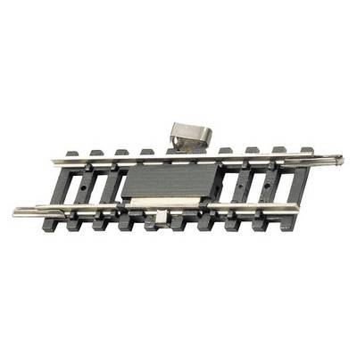 A small piece of model railway track with a magnetic uncoupling element in the middle for separating wagons.