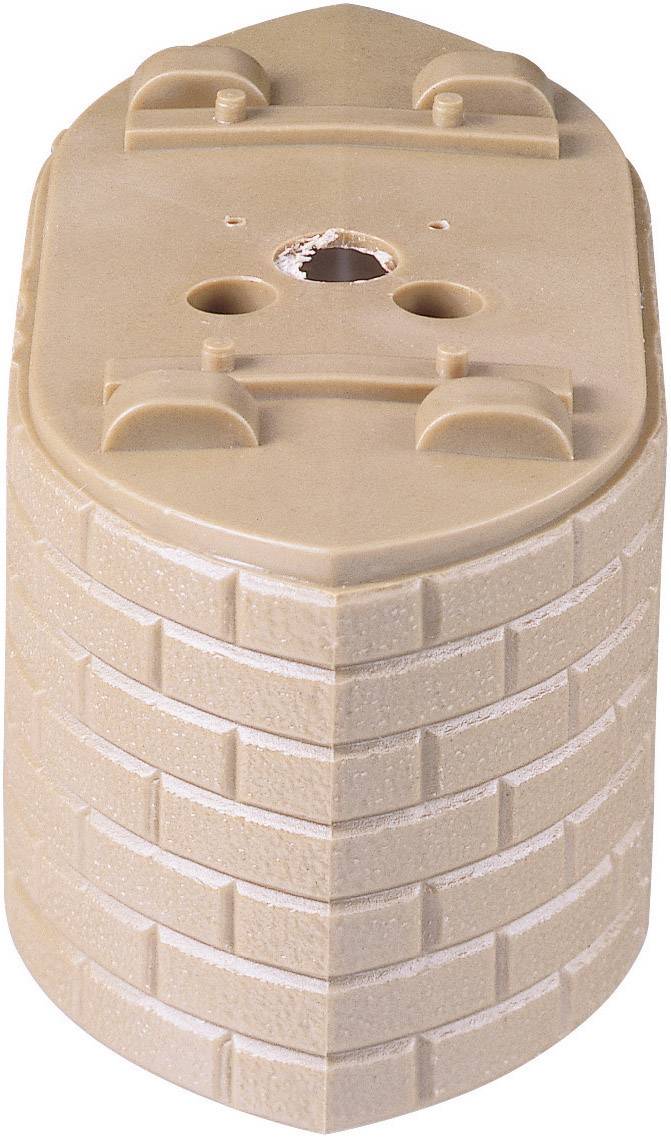 A beige plastic cylinder with a textured surface and several holes at the top, potentially part of a plug or connection system.