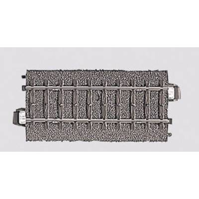 Aerial view of a model railway track on a grey surface. The track shows a straight section with sleepers and ballast bed.