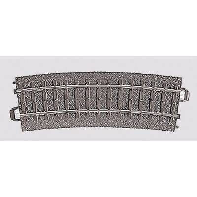 Curved track section for model railway. Tracks are made of metal, mounted on a rocky surface.