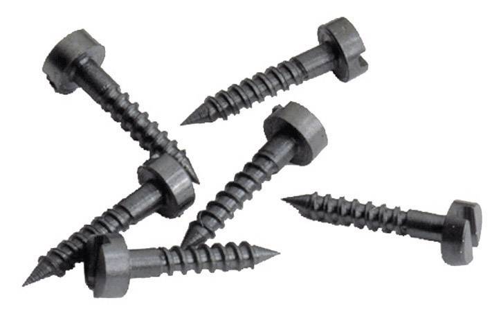 Six black hexagonal head screws with pointed ends are lying on a white background.