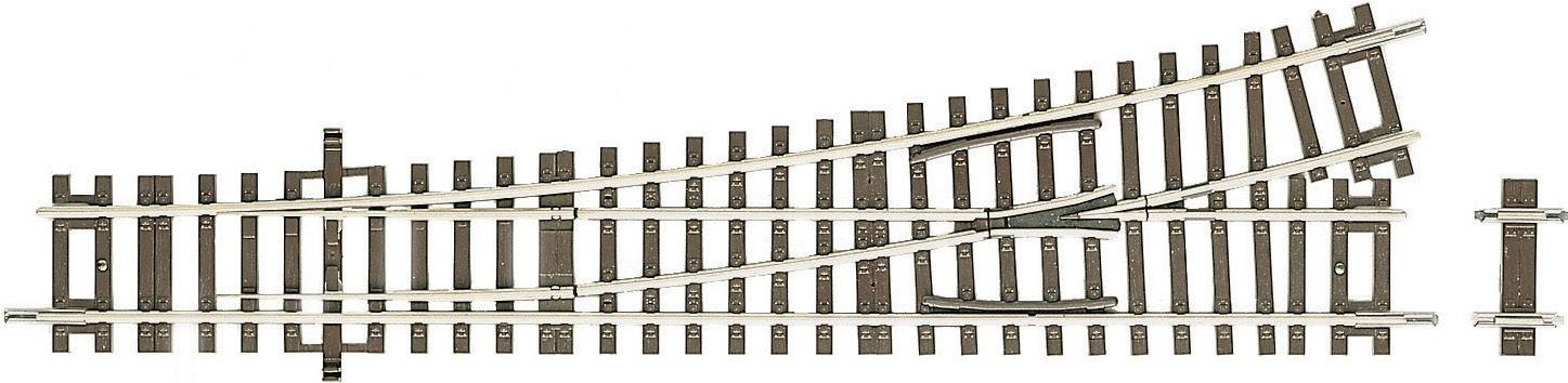 Railway track point with wooden sleepers, which allows a junction in two directions.