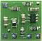 A green electronic component with multiple integrated circuits and resistors, suitable for a circuit board.