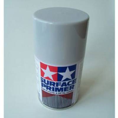 Spray can with 'Surface Primer' label for plastic and metal. Contains red and blue stars as design elements.