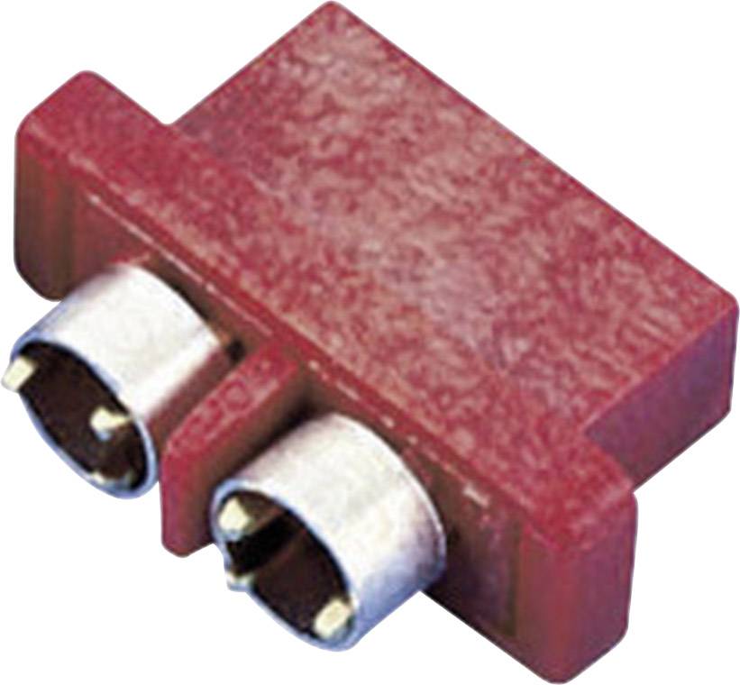Red electrical connector with two metal contacts. It is used for connecting or securing electrical circuits.