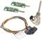 Two green electronic circuit boards, a multi-coloured cable with connectors and a round, white cable with a plug. Components for electronic assemblies.