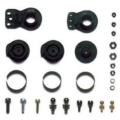 'Set of black rubber and metal discs along with screws, nuts and bolts in various sizes and shapes.'