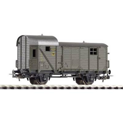 A grey goods wagon on a section of railway track. The wagon has a semi-circular roof shape and sliding doors on both sides.