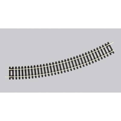 A curved model railway track made of black and silver metal on a grey background.