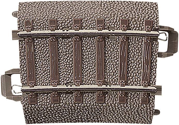 Small plastic model railway track with brown ballast bed and silver-coloured rails, curved section of track.