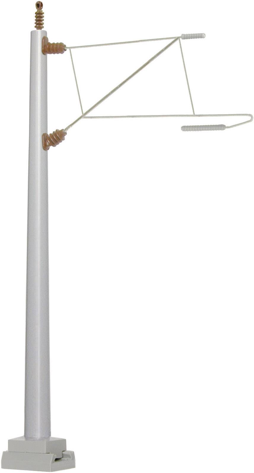 A light grey model pylon for model railways, with insulators and current collector, mounted on a white base.