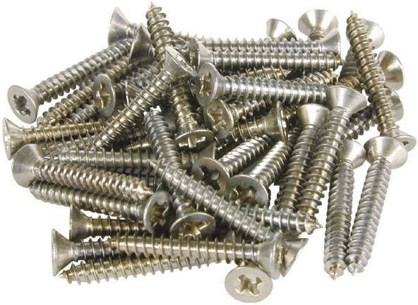 A pile of silver and gold Phillips head screws of various sizes lies on a white background.