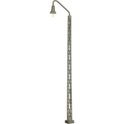 A decorative street lamp with a classic design, radiating a warm light.